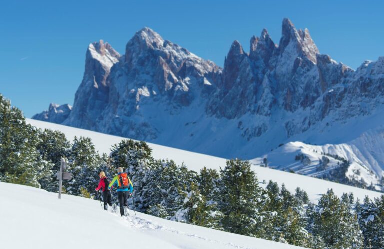 Snowshoe hiking in the Dolomites winter